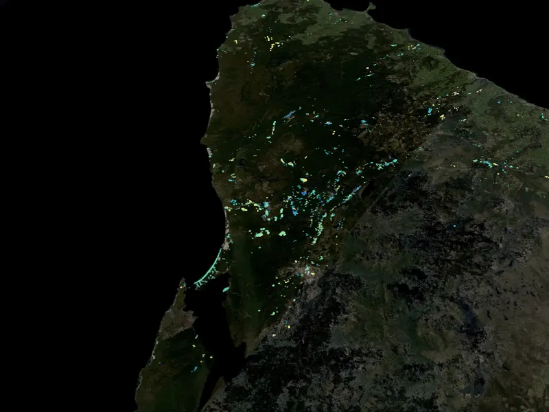 Drill holes coloured by year across western Tasmania on a satellite map