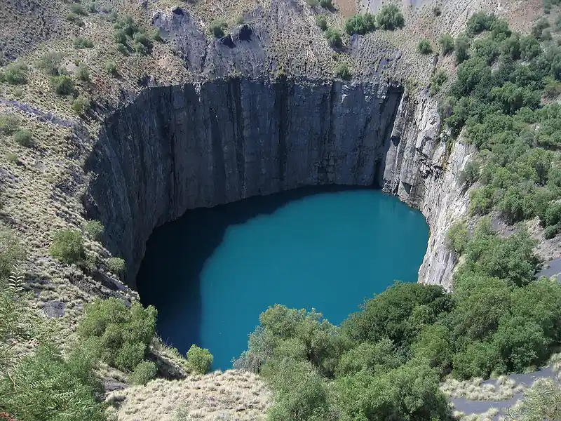 The Big Hole at Kimberley, South Africa, seen from above, with water at the bottom