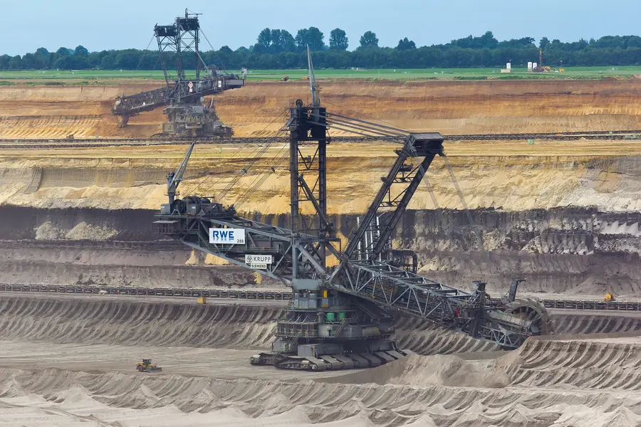 A bucket wheel excavator on the terraced lignite face of Garzweiler, with another on the bench behind